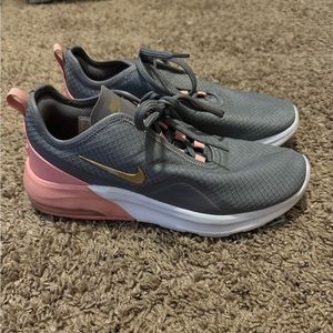 Grey and Pink nike airs. Women’s size 9. In perfect condition.